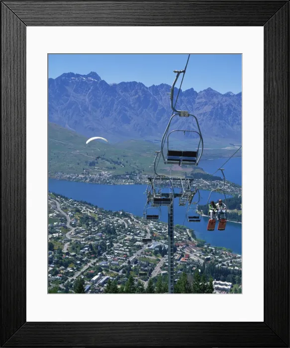 Framed Print : Tourists on a chair lift with Lake Wakatipu Framed Print : Tourists on a chair lift with Lake Wakatipu