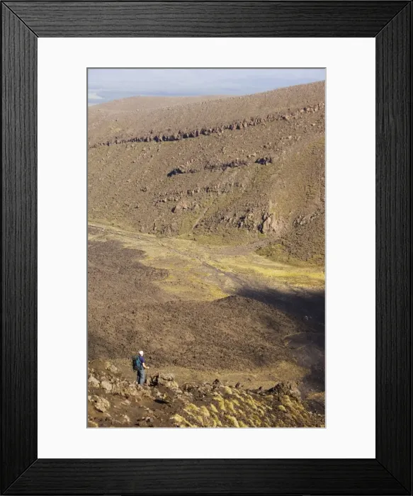 Framed Print : Hikers walking through a lava field on the Tongariro Crossing Framed Print : Hikers walking through a lava field on the Tongariro Crossing