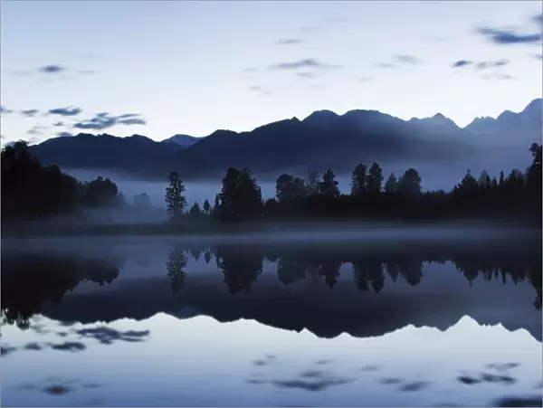 Lake Matheson at night reflecting a near perfect image