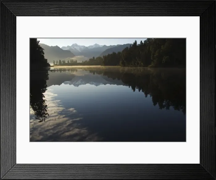 Framed Print : Lake Matheson in the evening reflecting a near perfect Framed Print : Lake Matheson in the evening reflecting a near perfect