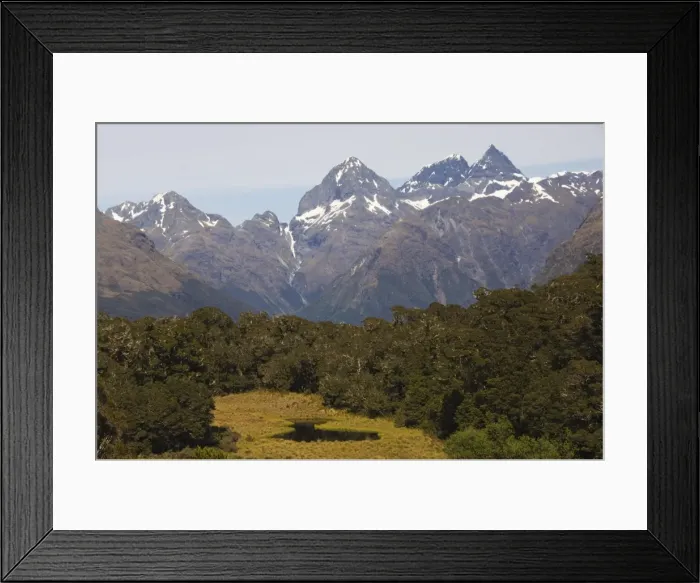 Framed Print : A mountain tarn and snow capped mountains on the Routeburn Track Framed Print : A mountain tarn and snow capped mountains on the Routeburn Track