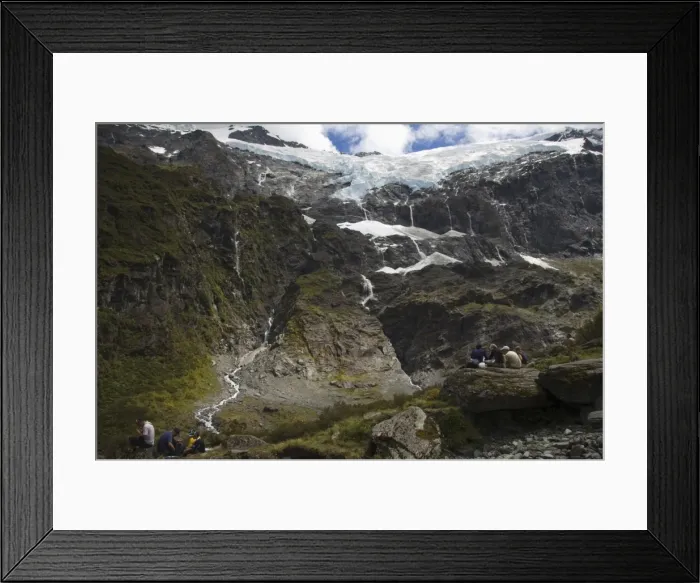 Framed Print : Hikers watch water cascading off Rob Roy Glacier Framed Print : Hikers watch water cascading off Rob Roy Glacier