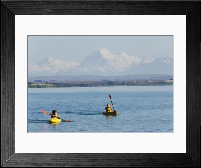 Framed Print : Kayaking on Lake Benmore and a distant Aoraki (Mount Cook) Framed Print : Kayaking on Lake Benmore and a distant Aoraki (Mount Cook)