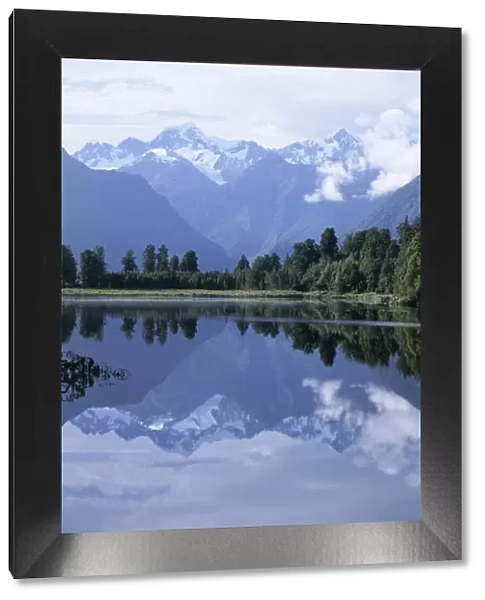 Mountains of the Southern Alps reflected in Lake Matheson