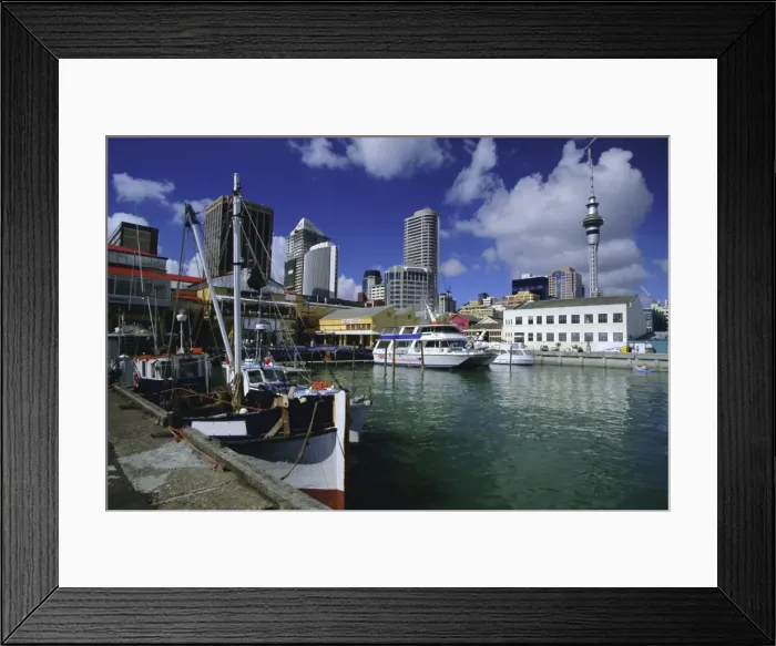 Framed Print : Boats on waterfront with skyline including Sky City Tower beyond Framed Print : Boats on waterfront with skyline including Sky City Tower beyond