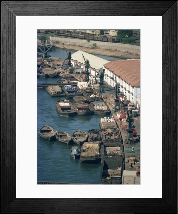 Framed Print : Boats and barges along the waterfront of the docks in Karachi Framed Print : Boats and barges along the waterfront of the docks in Karachi