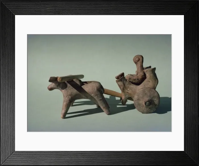 Framed Print : Figure in a chariot or cart drawn by animals Framed Print : Figure in a chariot or cart drawn by animals