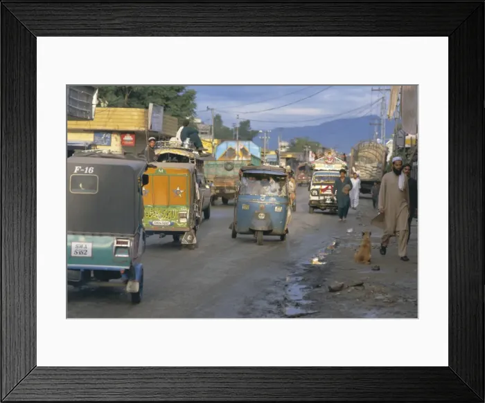 Framed Print : Three wheeled vehicles on main road Framed Print : Three wheeled vehicles on main road