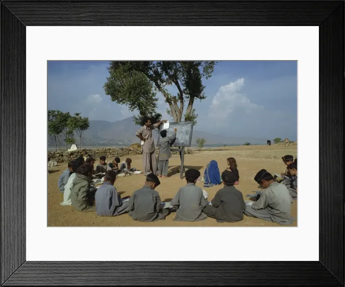 Framed Print : Two school girls separated from the boys at a village Framed Print : Two school girls separated from the boys at a village