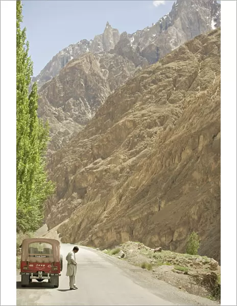 Gilgit jeep and driver on the Karakoram highway or KKH