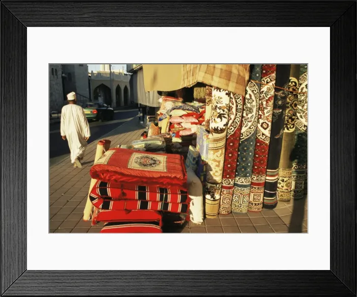 Framed Print : Carpets, cushions and rugs for sale near the Muttrah souk Framed Print : Carpets, cushions and rugs for sale near the Muttrah souk
