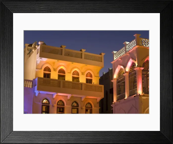 Framed Print : Colourfully illuminated latticed houses along the corniche Framed Print : Colourfully illuminated latticed houses along the corniche