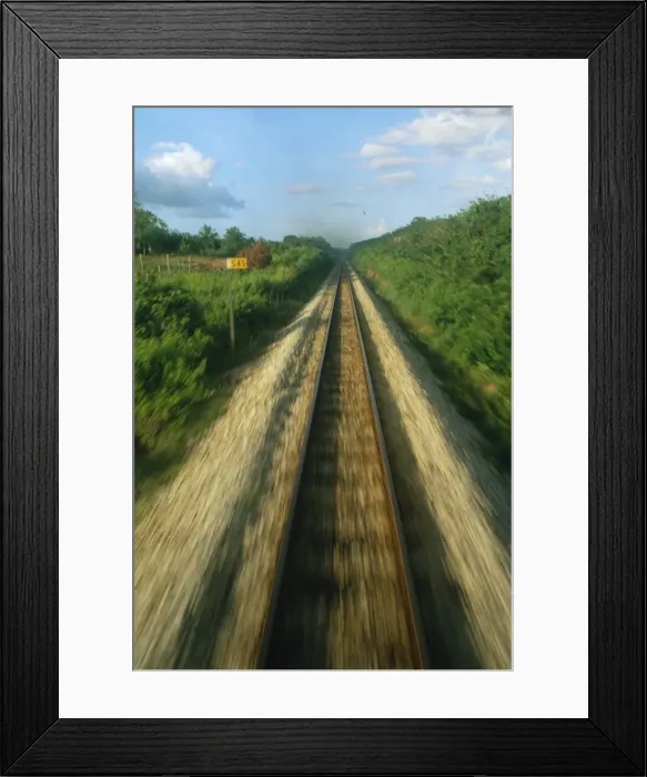 Framed Print : Single railway line seen from the train at speed Framed Print : Single railway line seen from the train at speed