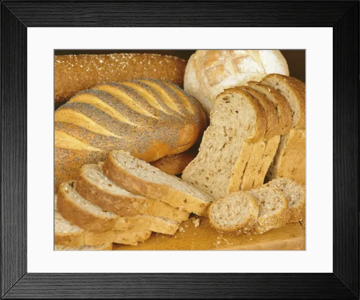 Framed Print : Bread loaves and slices of bread Framed Print : Bread loaves and slices of bread