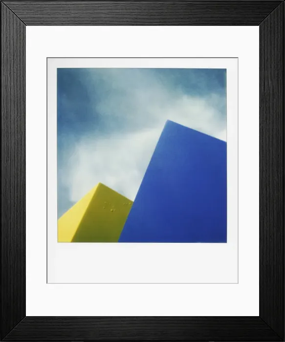Framed Print : Blue and yellow shapes against sky Framed Print : Blue and yellow shapes against sky