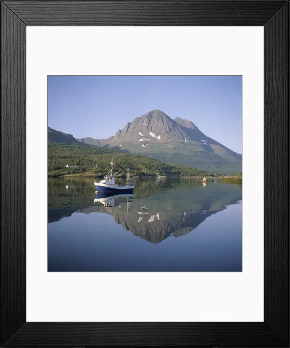 Framed Print : Boat and mountains reflected in tranquil water Framed Print : Boat and mountains reflected in tranquil water
