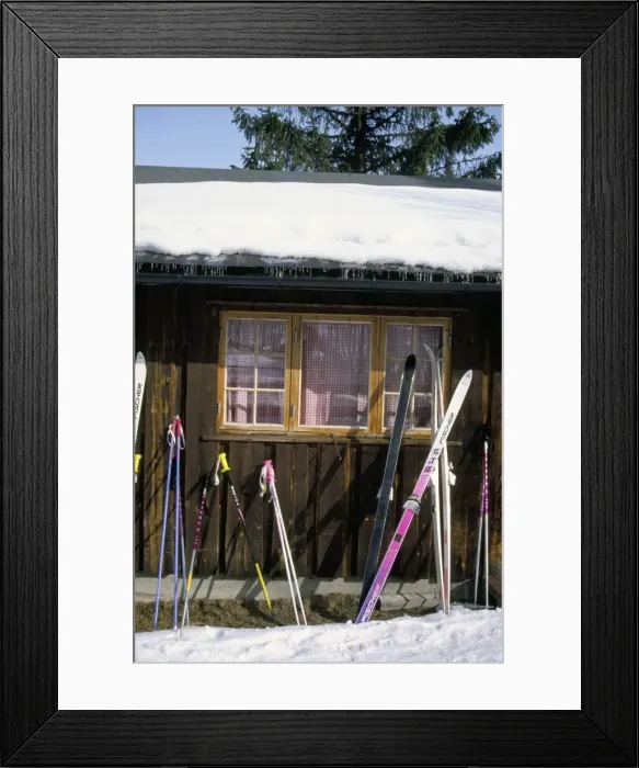 Framed Print : Skis outside wooden building Framed Print : Skis outside wooden building