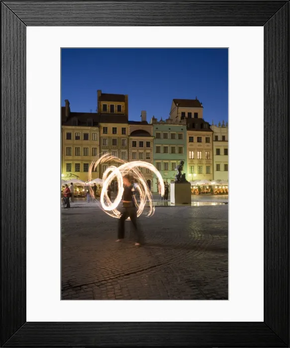 Framed Print : Street performers in front of houses Framed Print : Street performers in front of houses