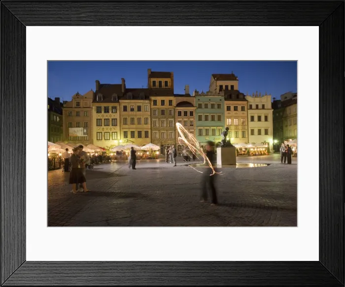 Framed Print : Street performers in front of houses Framed Print : Street performers in front of houses