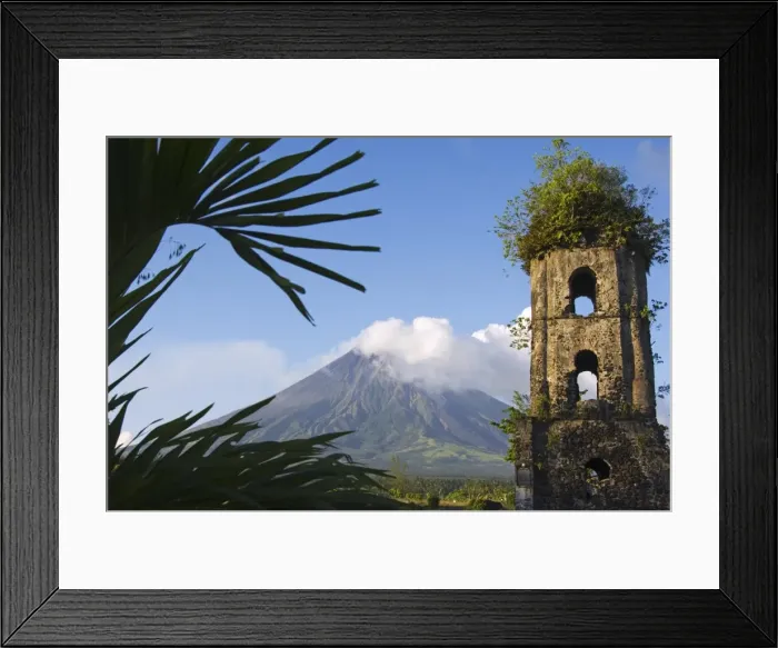 Framed Print : Church belfry ruins and volcanic cone with smoke plume of Mount Mayon Framed Print : Church belfry ruins and volcanic cone with smoke plume of Mount Mayon