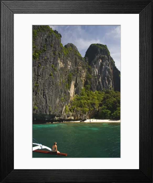 Framed Print : Island hopping by catamaran around coral fringe in clear waters Framed Print : Island hopping by catamaran around coral fringe in clear waters