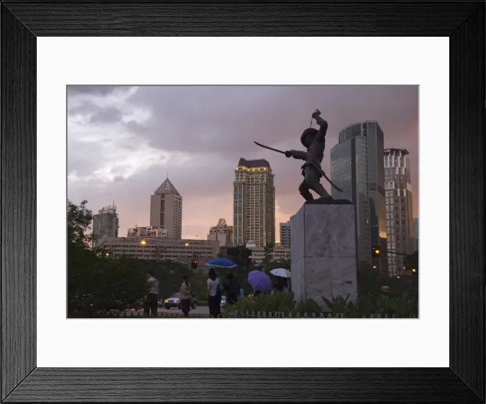 Framed Print : Monument of Soldier and city skyline at sunset Framed Print : Monument of Soldier and city skyline at sunset