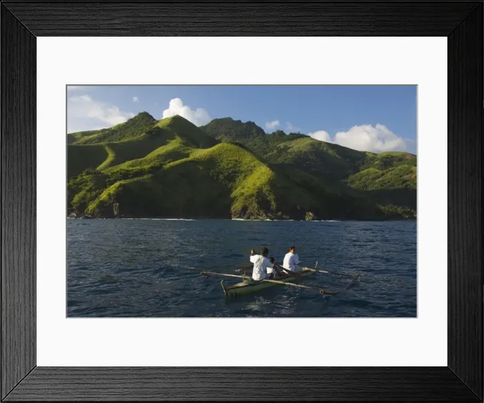 Framed Print : Spectacular coastal scenery and small fishing boat Framed Print : Spectacular coastal scenery and small fishing boat