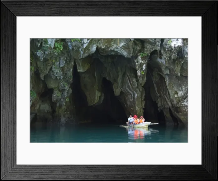 Framed Print : Tourists in paddle boat at entrance to Riverine Cave Framed Print : Tourists in paddle boat at entrance to Riverine Cave