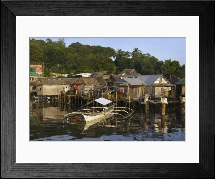 Framed Print : Waterfront stilt houses and catamaran fishing boat Framed Print : Waterfront stilt houses and catamaran fishing boat