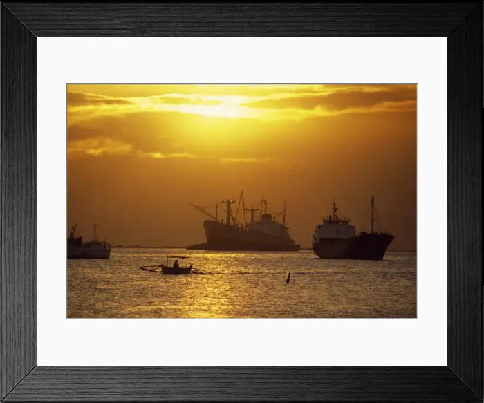 Framed Print : Cargo ships and outrigger canoe in Manila Bay at sunset Framed Print : Cargo ships and outrigger canoe in Manila Bay at sunset
