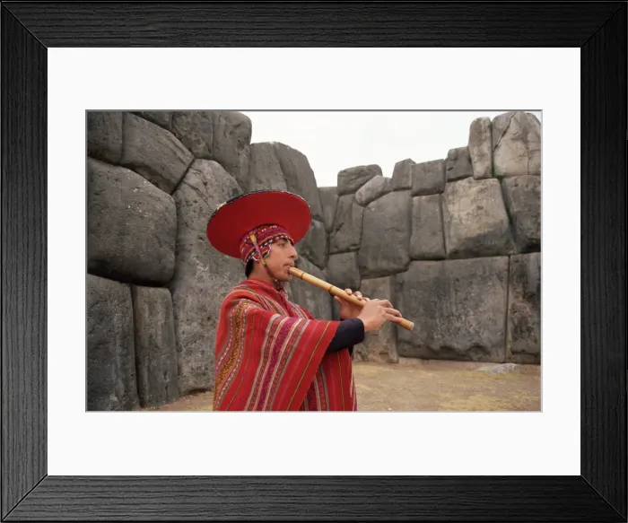 Framed Print : Portrait of a Peruvian man playing a flute Framed Print : Portrait of a Peruvian man playing a flute