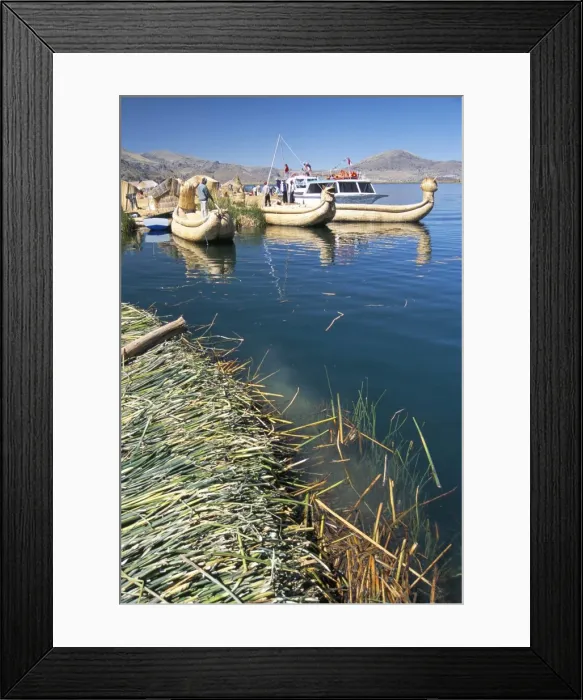 Framed Print : Traditional Uros (Urus) reed boats at floating island Framed Print : Traditional Uros (Urus) reed boats at floating island