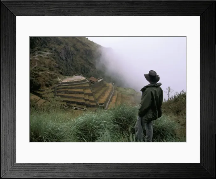 Framed Print : Tourist watches clouds swirl around mountains Framed Print : Tourist watches clouds swirl around mountains