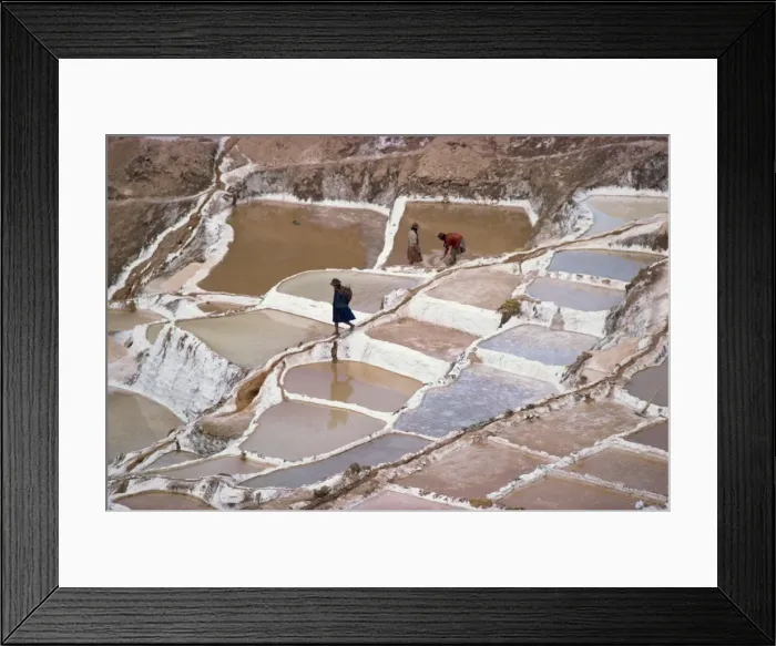 Framed Print : Workers in the salt pans on terraces at Salinas Framed Print : Workers in the salt pans on terraces at Salinas
