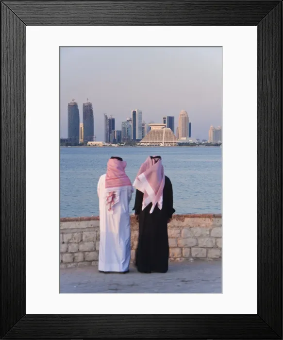 Framed Print : Two men wearing traditional dress of thobe and gutra