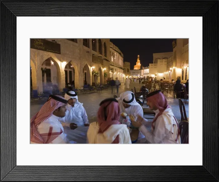 Framed Print : A group of men in Arabian dress in the restored Souq Waqif Framed Print : A group of men in Arabian dress in the restored Souq Waqif