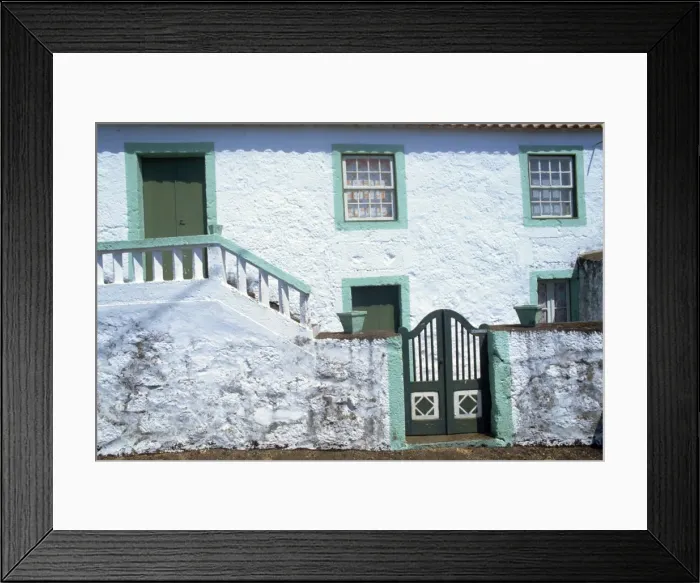 Framed Print : Whitewashed house with wall and gate at Terras on Framed Print : Whitewashed house with wall and gate at Terras on
