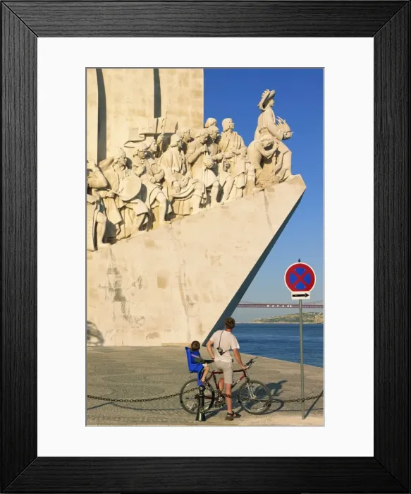 Framed Print : Father and son on a bicycle in front of the Monument Framed Print : Father and son on a bicycle in front of the Monument
