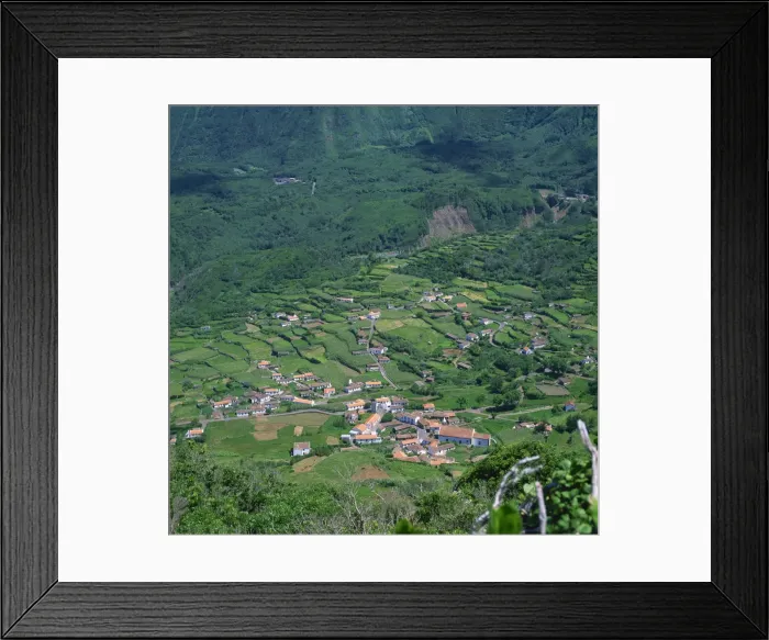Framed Print : Low aerial landscape of houses and fields on the island Framed Print : Low aerial landscape of houses and fields on the island