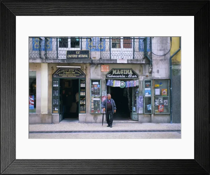 Framed Print : Typical shop fronts in the city centre Framed Print : Typical shop fronts in the city centre