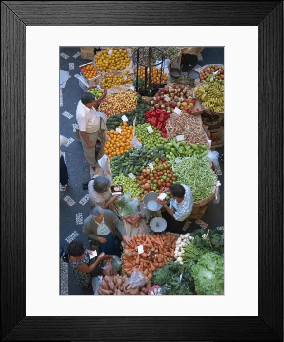 Framed Print : People at a fruit and vegetable stall in the market hall in Funchal Framed Print : People at a fruit and vegetable stall in the market hall in Funchal