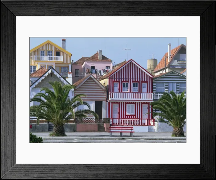 Framed Print : Exteriors of painted houses on a street in Costa Nova Framed Print : Exteriors of painted houses on a street in Costa Nova