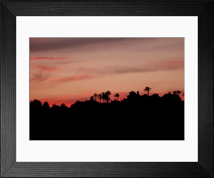Framed Print : Skyline silhouetted in the evening sky Framed Print : Skyline silhouetted in the evening sky