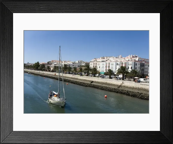 Framed Print : A sailing cruiser leaves the port of Lagos Framed Print : A sailing cruiser leaves the port of Lagos