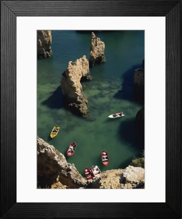 Framed Print : Aerial view of small boats in the sea alongside sea Framed Print : Aerial view of small boats in the sea alongside sea