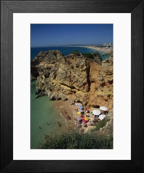 Framed Print : Aerial view of tourists on a small beach or cove on Framed Print : Aerial view of tourists on a small beach or cove on