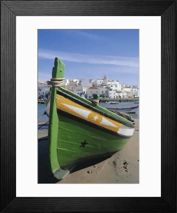 Framed Print : Fishing boat and village near Portimac Framed Print : Fishing boat and village near Portimac
