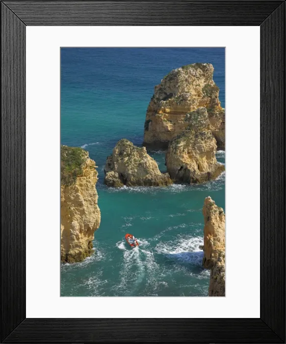 Framed Print : Excursion boat to the caves at Ponte da Piedade near Lagos Framed Print : Excursion boat to the caves at Ponte da Piedade near Lagos