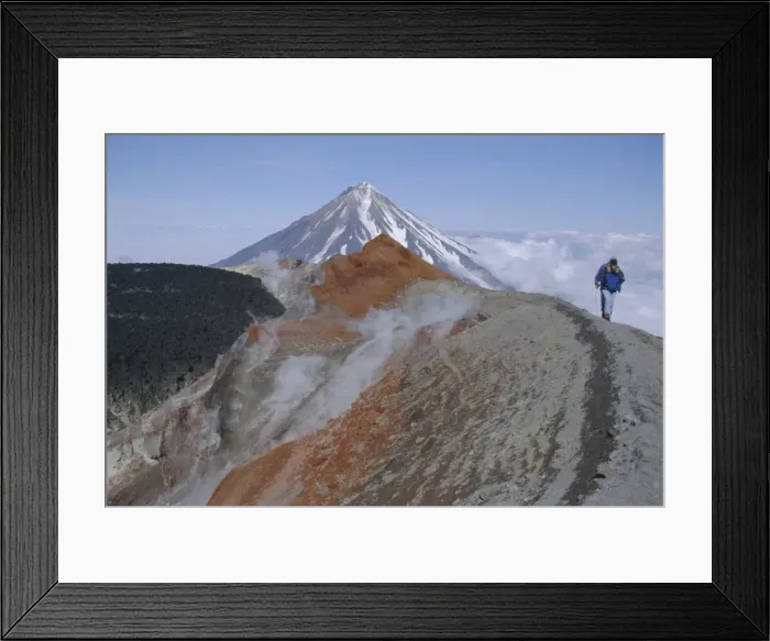 Framed Print : Koryaksky volcano seen beyond walkers on crater rim of Avacha volcano Framed Print : Koryaksky volcano seen beyond walkers on crater rim of Avacha volcano
