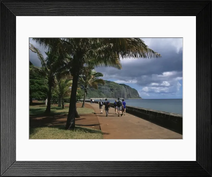 Framed Print : Walking along Le Barachois, the main promenade, St